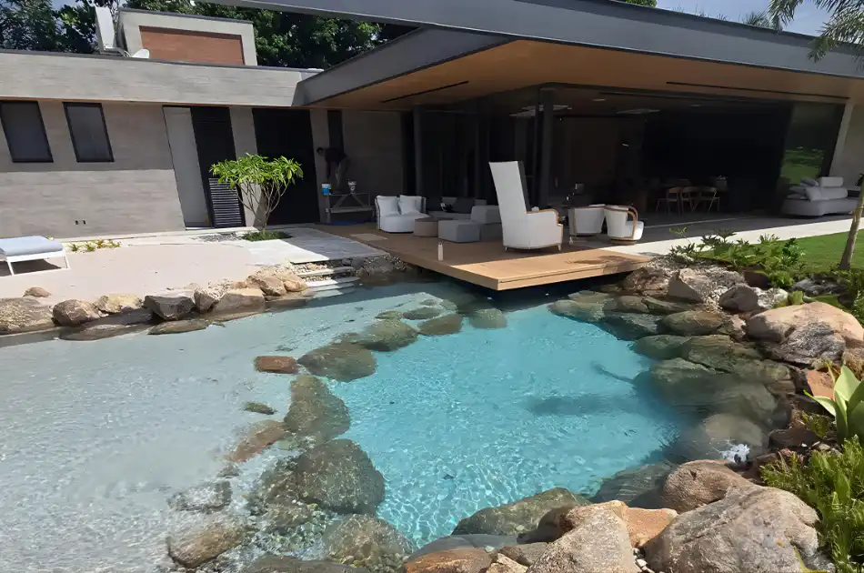 Anse model fine-sand lagoon, a completed Clair Lagon lagoon integrated into a garden landscape